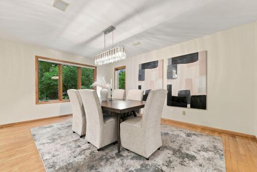 The formal dining room offers generous space for dinners, holidays, and entertaining.