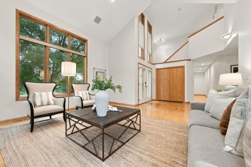 Vaulted ceilings and large windows give the main living space an airy, inviting feel.