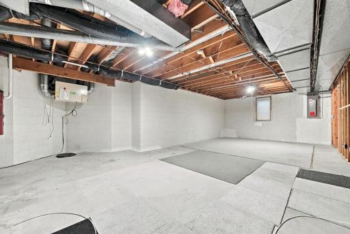 Wide-open lower-level space is ready for the next owner’s vision.