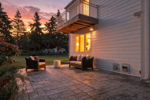 The patio offers a private outdoor gathering space just beyond the main living areas.