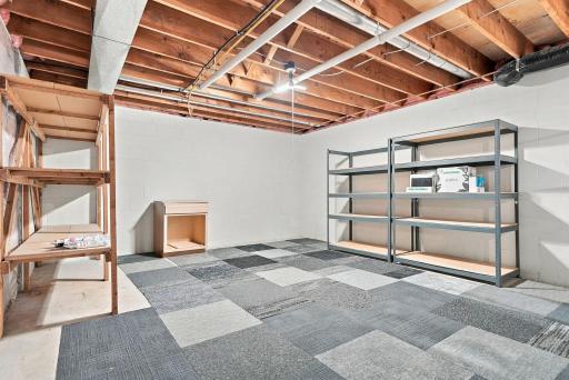Generous square footage downstairs creates flexibility for a future recreation room, fitness space, guest suite, or more.