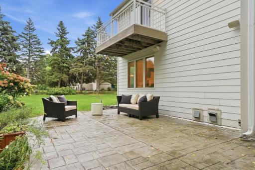 A private patio creates an intimate outdoor space for conversation and quiet evenings.