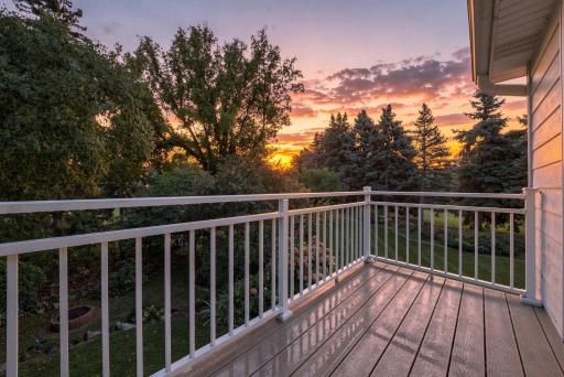 Direct deck access creates an easy indoor-outdoor connection from the primary suite.