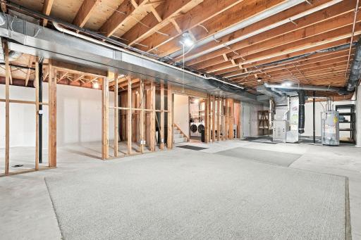 The unfinished lower level offers substantial room for storage today and possibilities for tomorrow.