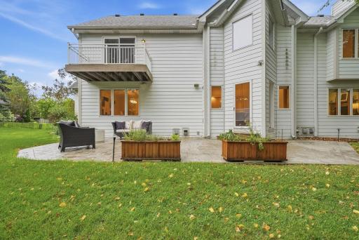 Multiple outdoor living areas take advantage of the home’s beautiful wraparound setting.