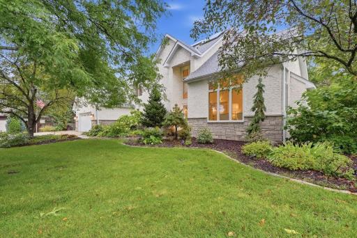 Setting on a quiet, oversized lot with gorgeous, curated landscaping, you cannot beat the location of this newest Mendota Heights listing.
