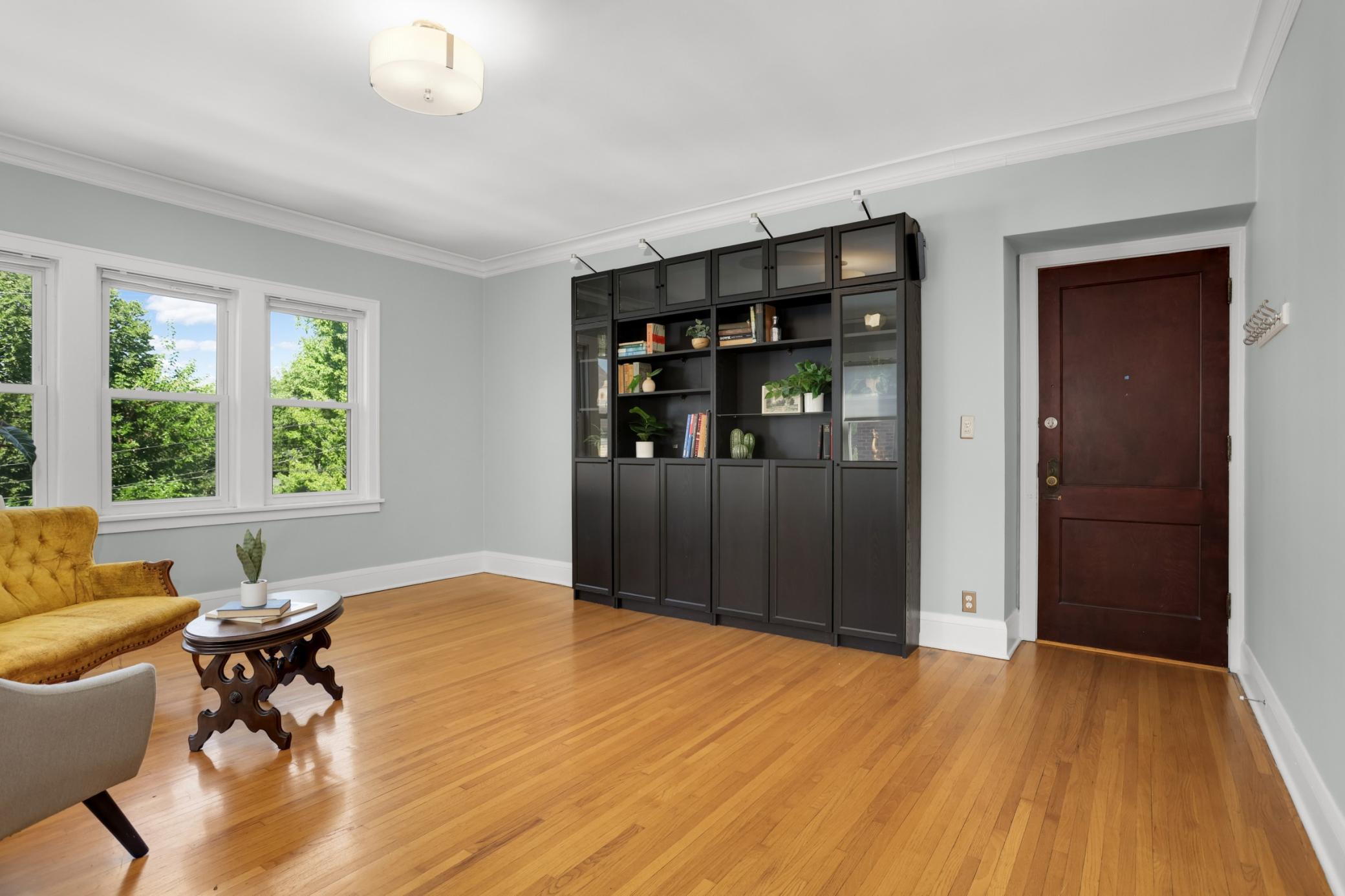 The entertainment center stays with the unit and offers great storage.
