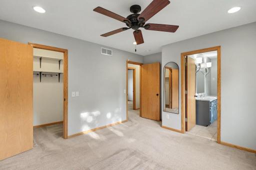 Additional view of the primary bedroom with fresh carpet.