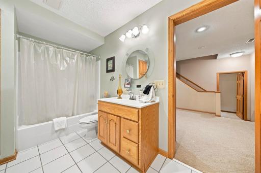 Lower level full bath, not pictured is a large linen cabinet and "safe room".
