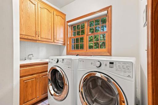The main floor laundry room is just off the kitchen.