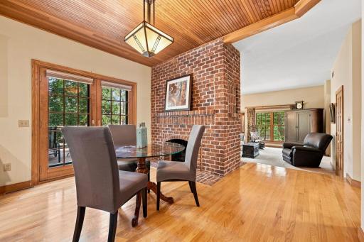 Double fireplace between the dinette and family room. New Marvin patio doors that walk out to the fantastic re-built dek.
