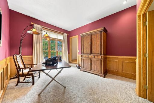 Main floor office with a beautiful wall of widows.