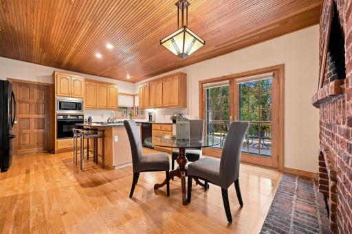 The heart of the home, the kitchen, has granite counters, center island, built-in oven and tongue and groove ceiling.
