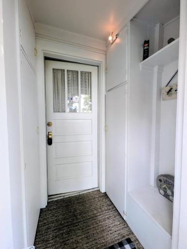 Entryway with closet and storage