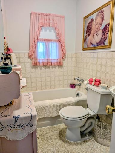 3/4 bathroom with built in vanity