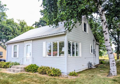 Steel siding, metal roof, new attic windows