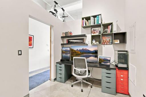 The spacious den could be used as an office or guest bedroom.
