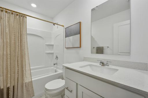 (Photo is of a model home, finishes will vary) This home features a full bath in the basement!