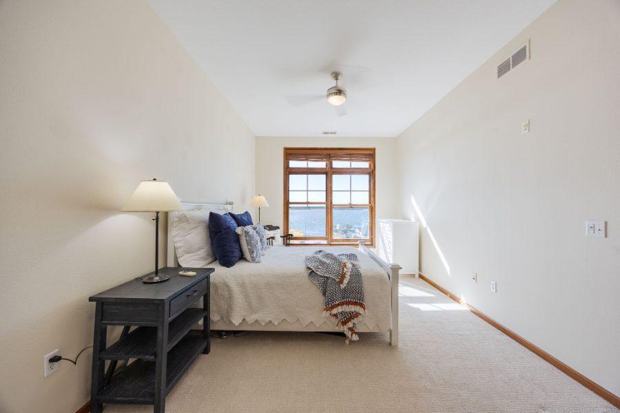 New carpet in light filled bedroom