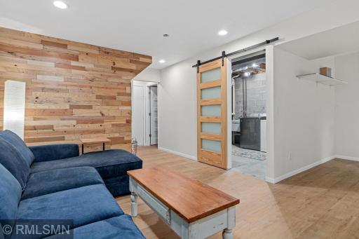The eye catching barn door makes this space even more cozy