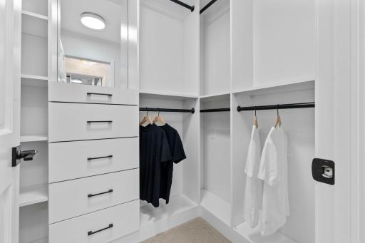 Primary suite offers two spacious walk-in closets