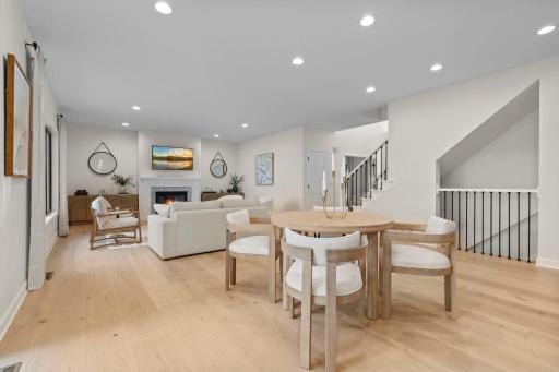 Relaxed gathering space with comfortable seating, warm tones, and an open layout that connects seamlessly to the kitchen and dining areas.