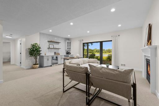 Spacious family room with a walk-out to patio