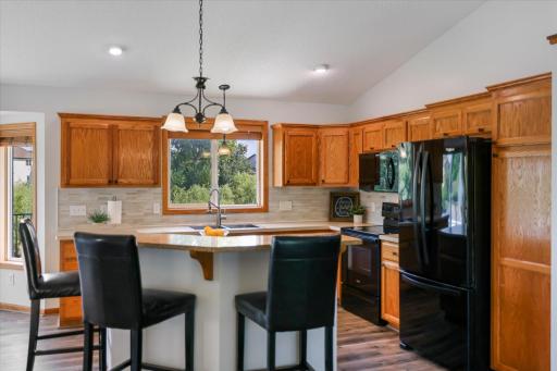 Open floor plan with a kitchen window, new sink and faucet!