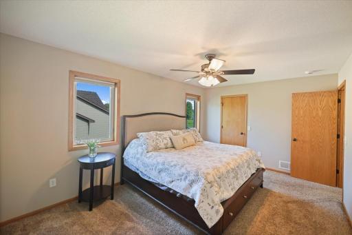 Large primary bedroom with walk-in closet...