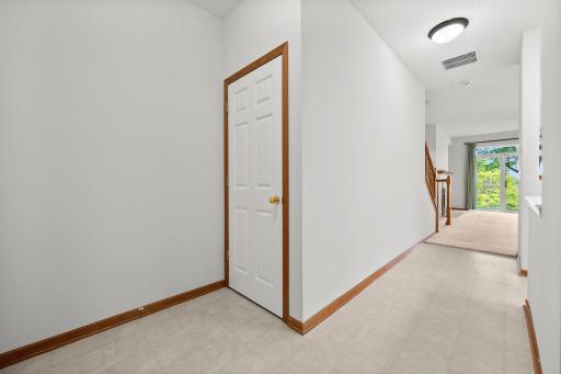Thoughtful main-level layout provides convenient access between the kitchen, living spaces, garage, and additional rooms