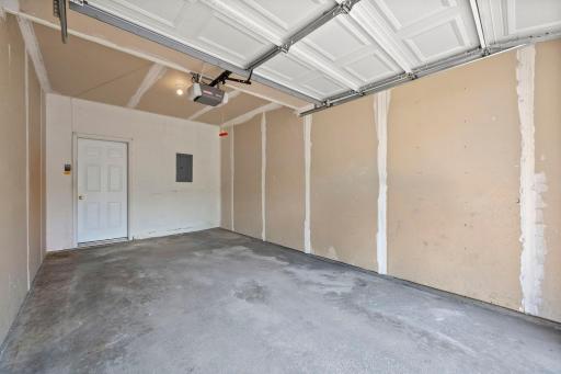 Attached garage provides secure parking, extra storage, and convenient direct access to the home