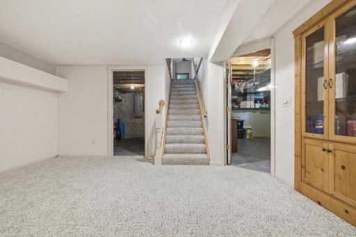 Recreation room towards utility room and storage