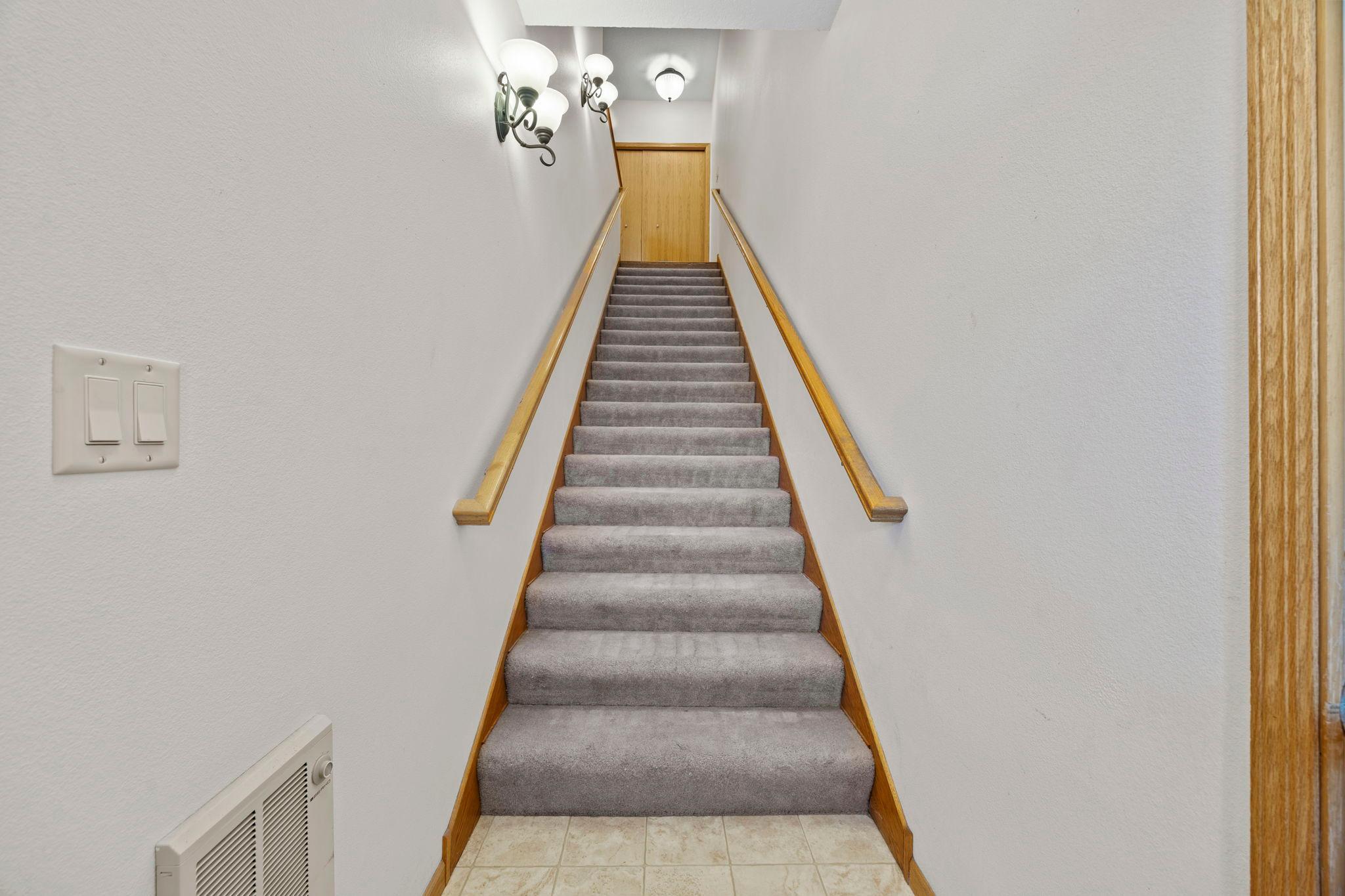 Private staircase leading to the second-floor residence