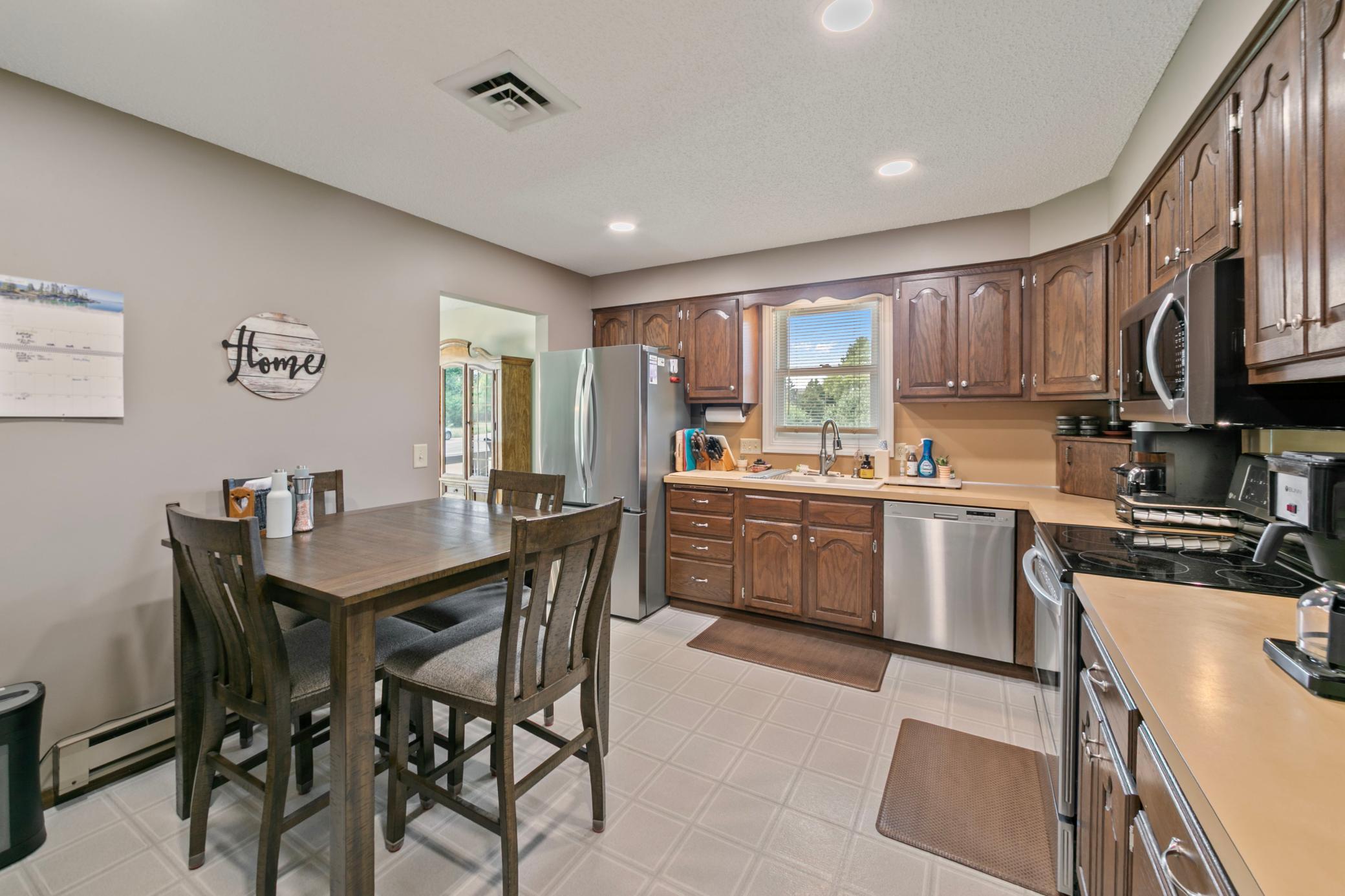 Newer flooring and plenty of natural light in the kitchen