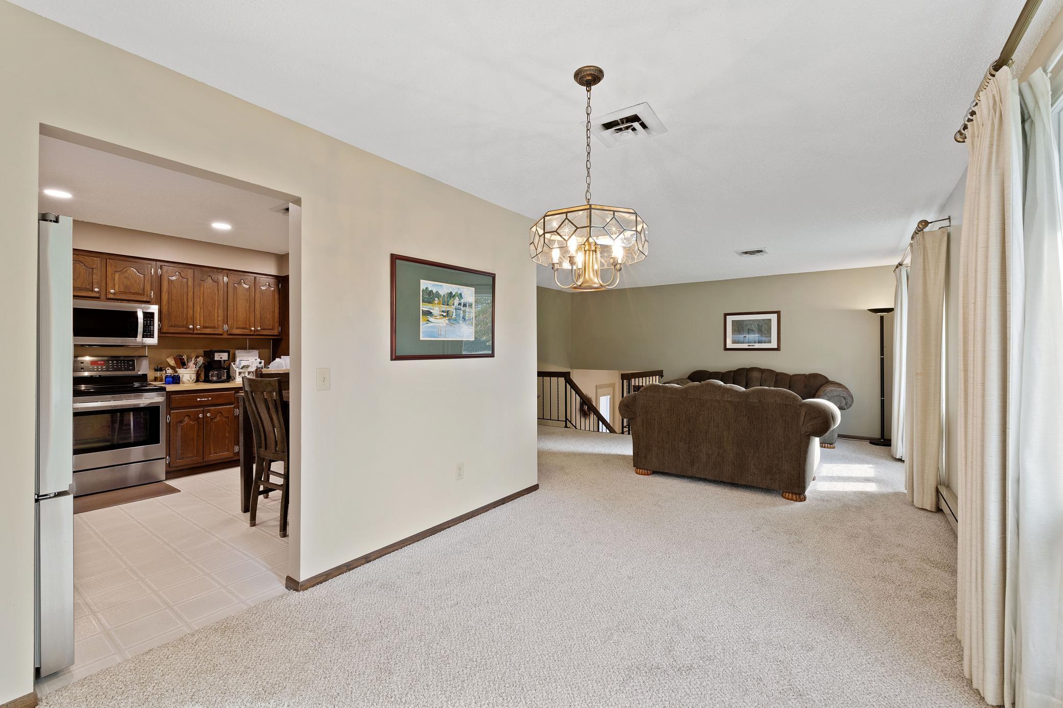 View from dining into living room with new carpet