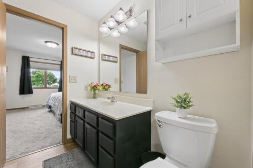 Primary Bedroom features walk thru full bath