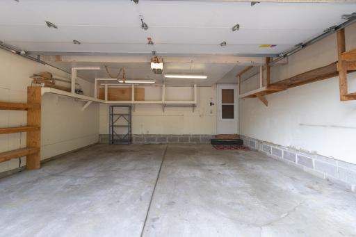 A garage worth sharing - does not get cleaner than this! Note the storm door on the entry.