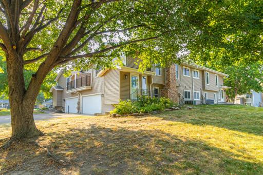This lovely three bedroom, two bathroom townhome sits on the corner of the cul-de-sac and is shaded by this beautiful tree. Green space/play space for your friends and family!