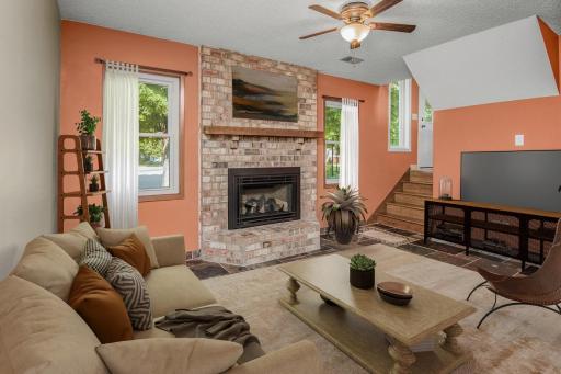 Once again, virtual staging, helps to visualize what this room could look like! A simple area rug really warms things up!