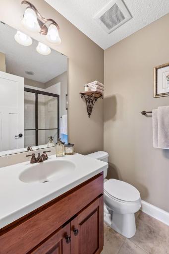 Upper-level ensuite bath offers added privacy and convenience.