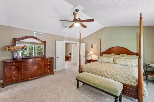 Spacious primary suite offers a comfortable retreat with abundant natural light.