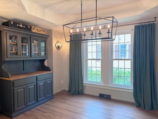A look into the formal dining room. Could also be used as a fourth/main floor bedroom with the addition of a door!