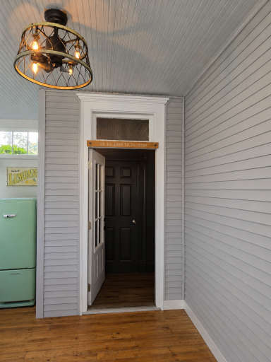 One more shot of the 3-season porch with the main entry beyond.
