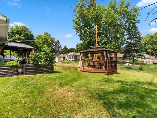 Enjoy all of the fantastic outdoor spaces this home has to offer, all within a fully fenced yard!