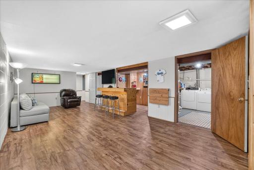MASSIVE lower level entertaining space with wet bar!