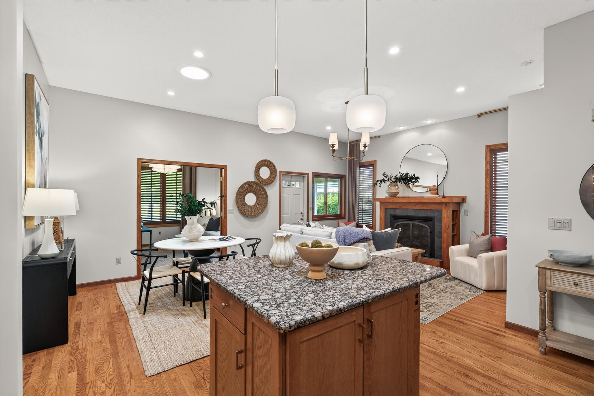 Gather around the island—the natural heart of the home.