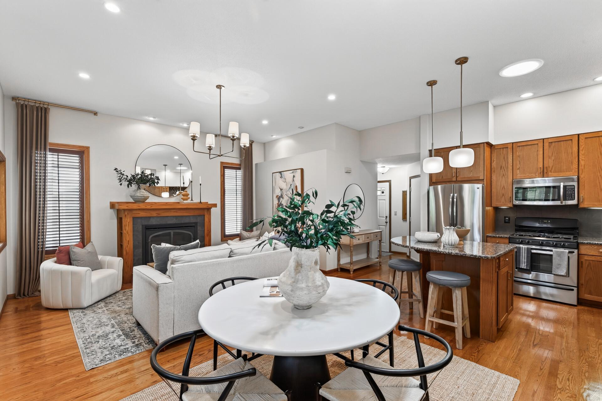 The spacious layout flows seamlessly from kitchen to dining to living spaces.