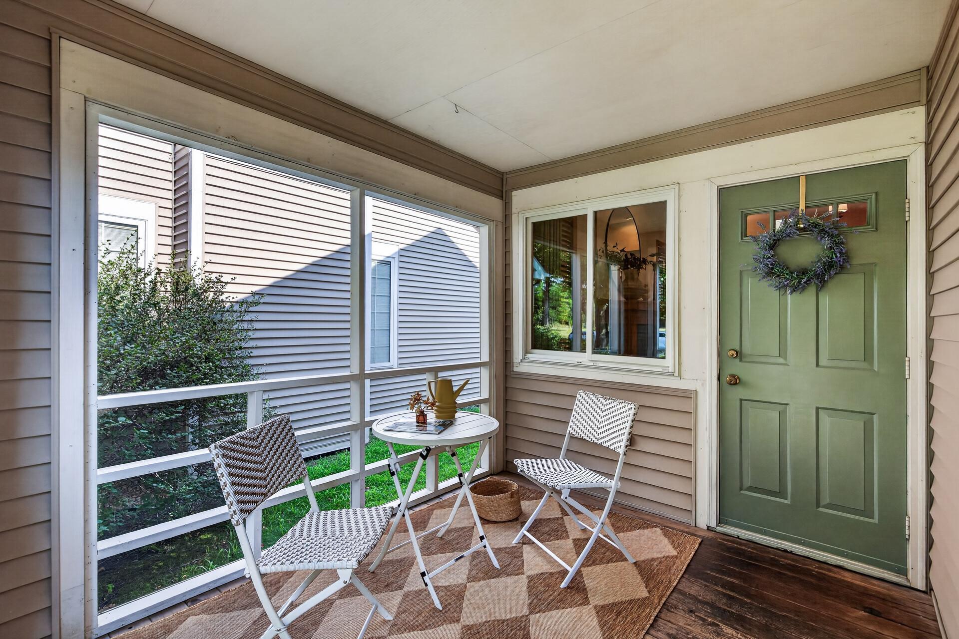 Enjoy coffee, cocktails, or quiet evenings from the screened front porch.