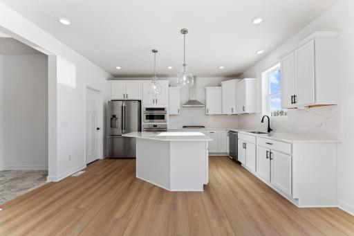 (All the following photos are of a similar home, actual finishes may vary.)