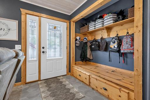 Beautiful front entry with custom built-in storage!